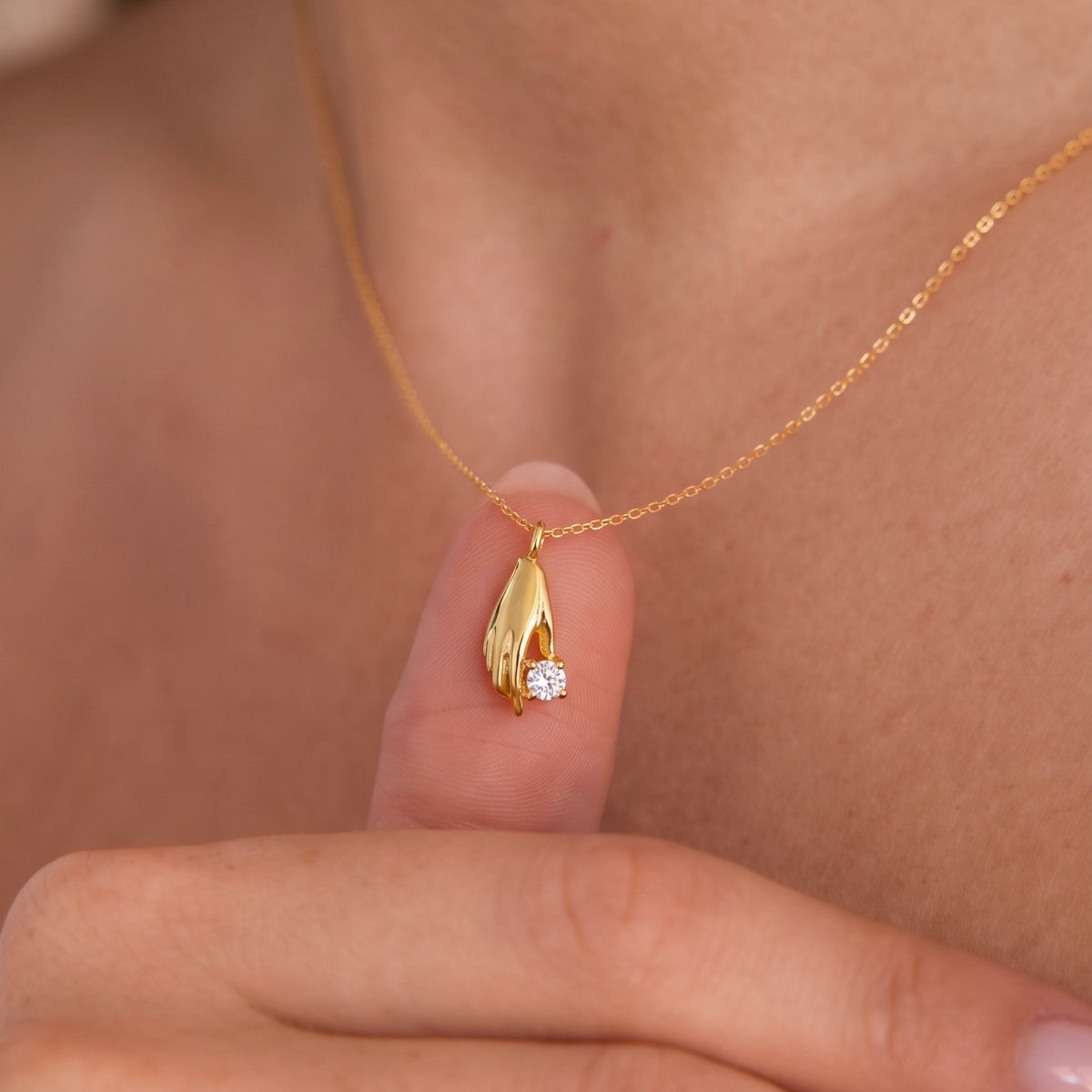 Holding Gem